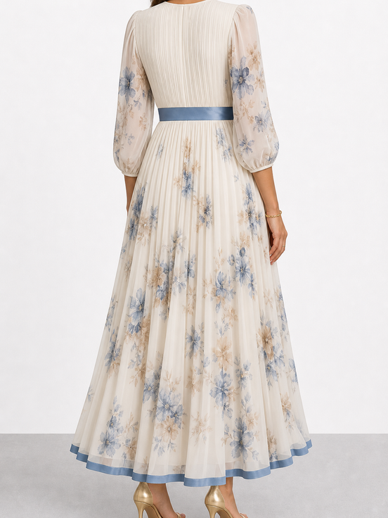 Paz | Vestido largo plisado floral atemporal