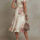 Camila | Vestido midi floral drapeado