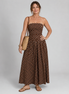 Sonia | Vestido midi sin tirantes con estampado de lunares