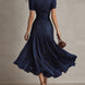 Adriana | Vestido midi de satén con rayas retro