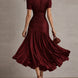 Adriana | Vestido midi de satén con rayas retro