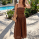 Sonia | Vestido midi sin tirantes con estampado de lunares