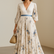Paz | Vestido largo plisado floral atemporal