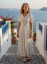 Celia | Vestido midi de manga corta con escote en V y cintura cruzada