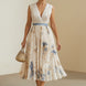 Paz | Vestido largo plisado floral atemporal