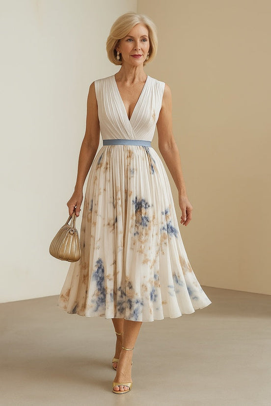 Paz | Vestido largo plisado floral atemporal