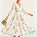 Paz | Vestido largo plisado floral atemporal